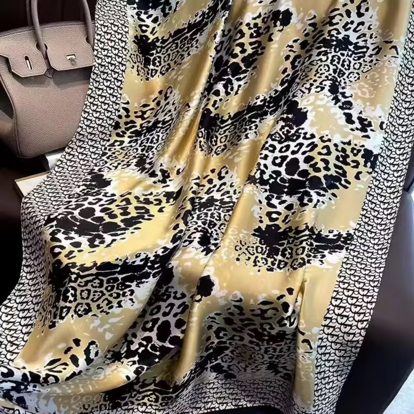 Designer border animal print silk stole in gold and black