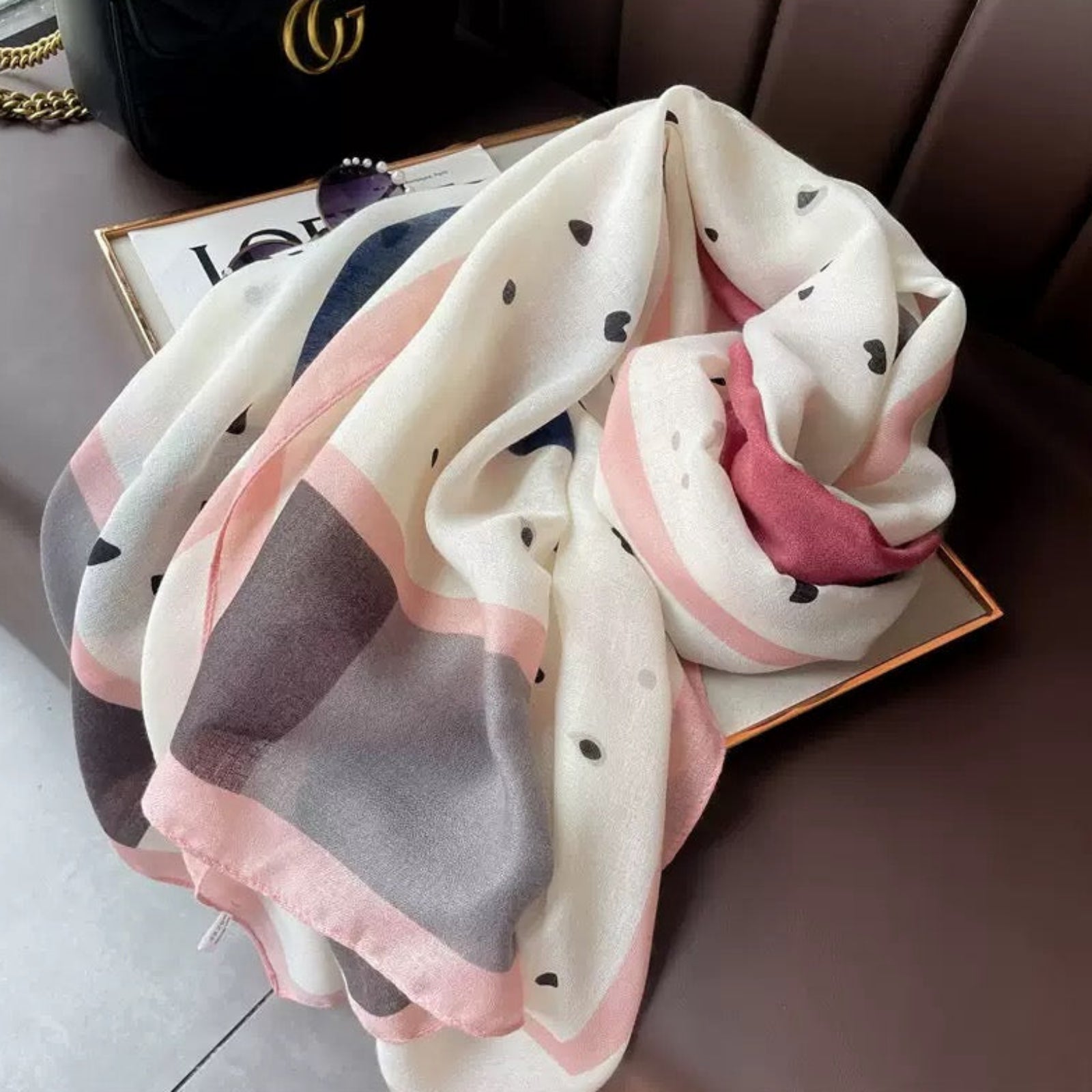 Soft cotton blend stole featuring abstract heart motifs