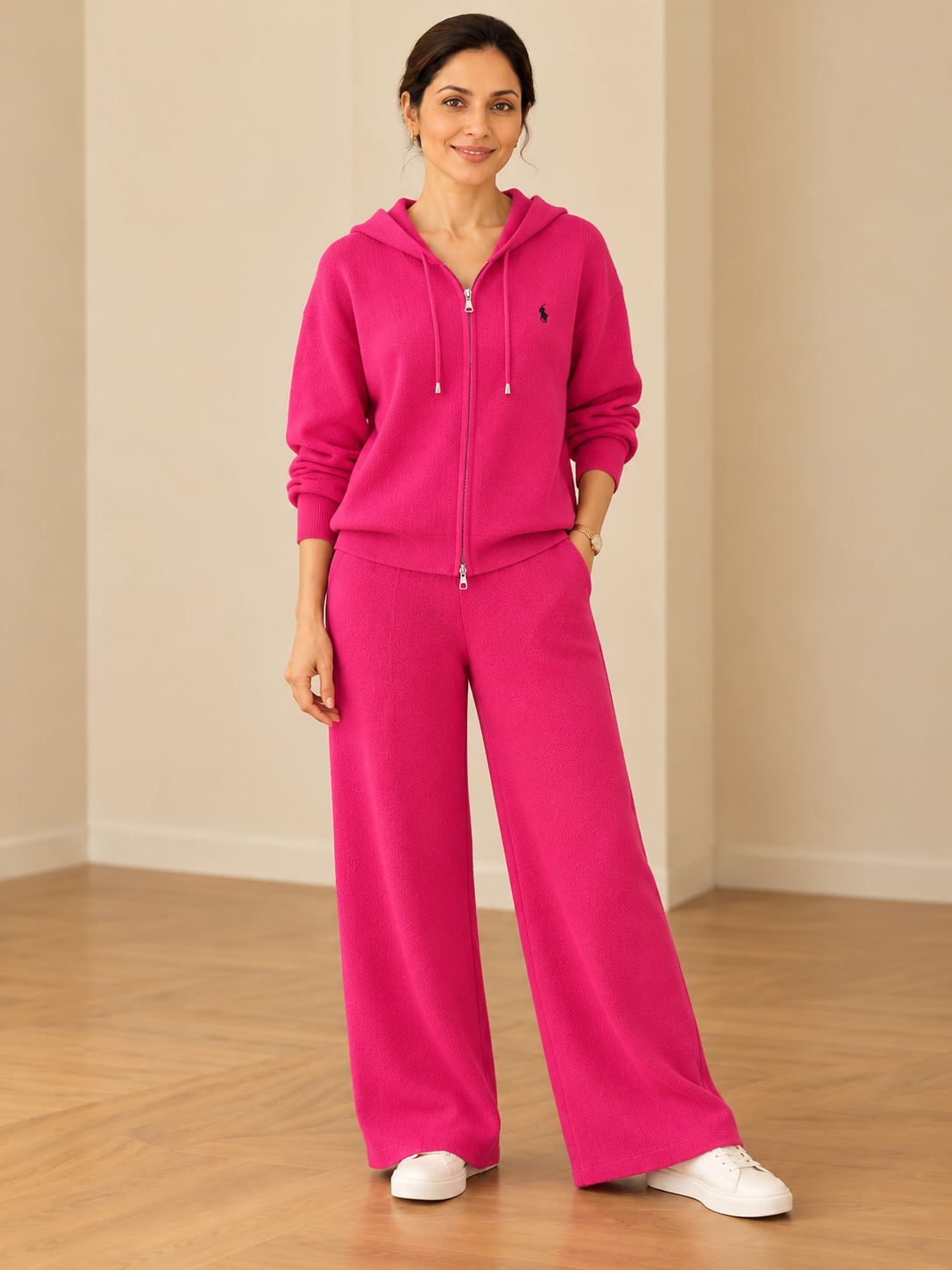 Chic ribbed knit hooded leisure suit for women in fuchsia pink with zip-up hoodie and wide-leg pants