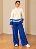 Cozy knit two-piece loungewear set for women in cobalt blue and ivory with striped sweater and wide-leg pants