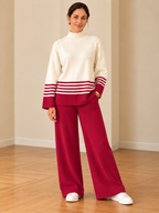 Cozy knit two-piece loungewear set for women in crimson and ivory with striped sweater and wide-leg pants