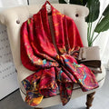 Crimson Royale Printed Silk Stole showing rich deep crimson red base with vibrant multicolour artistic print on smooth imitation satin silk in 180x90cm format
