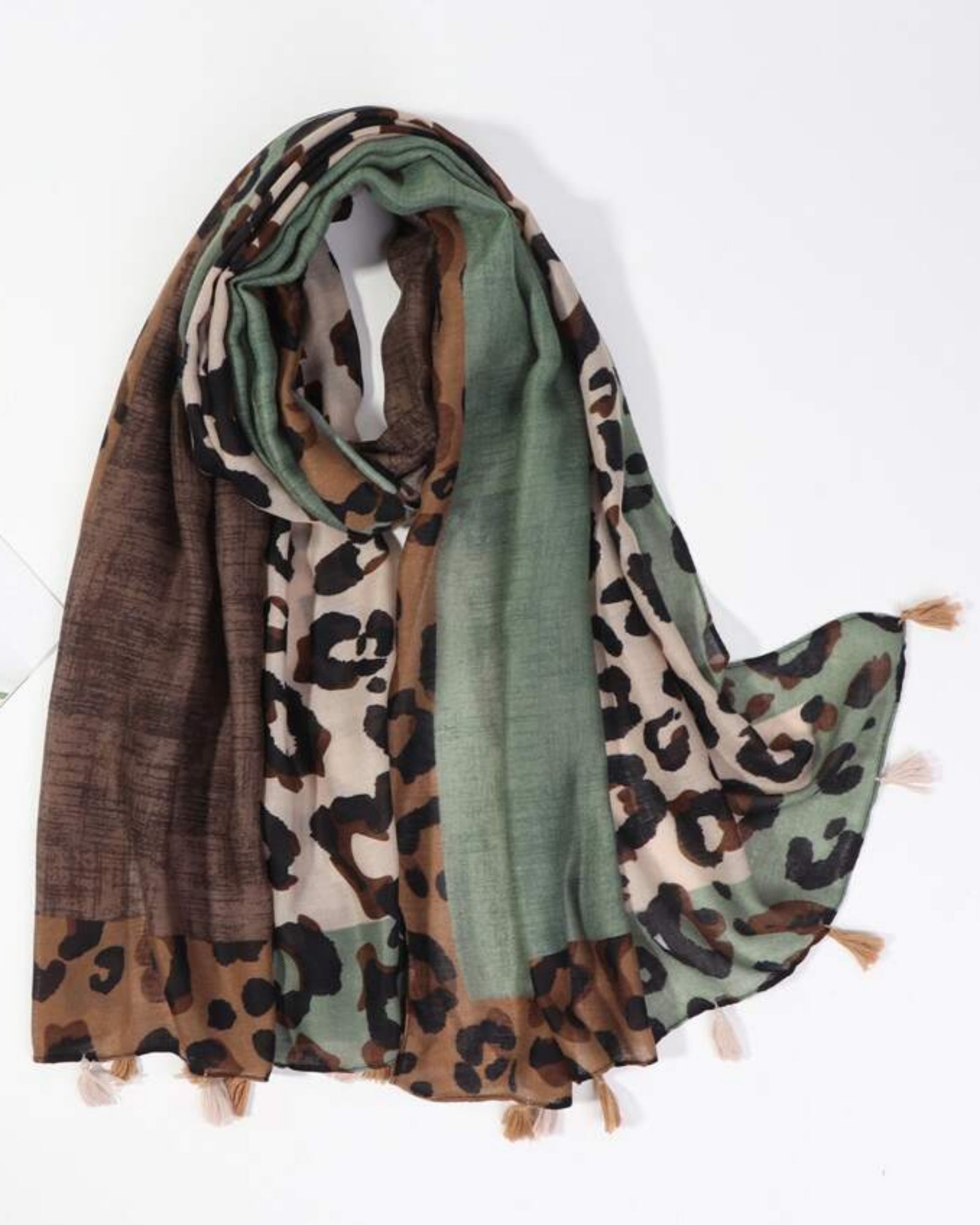 Earthy leopard print viscose cotton stole with tassel detailing
