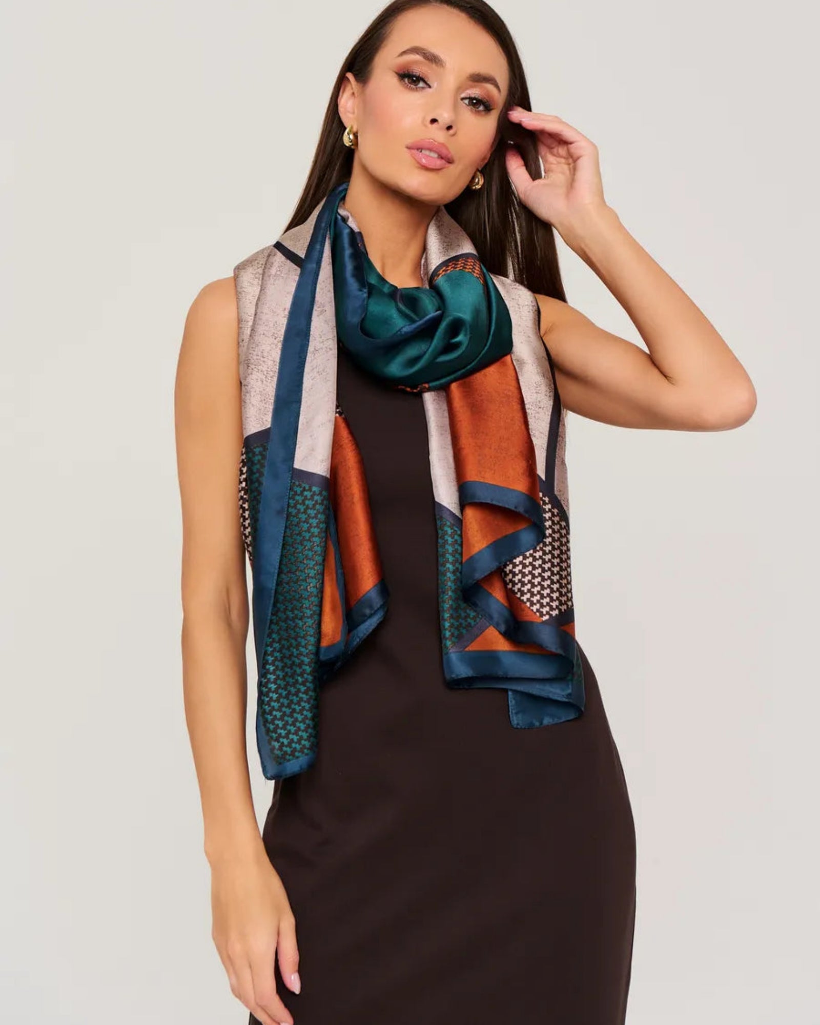 Geometric printed silk stole in emerald and rust