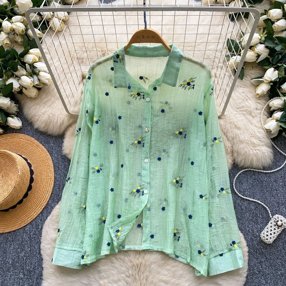 Floral Embroidered Gauze Blouse in Mint Green, relaxed fit long sleeve button-up top with navy and yellow flower embroidery