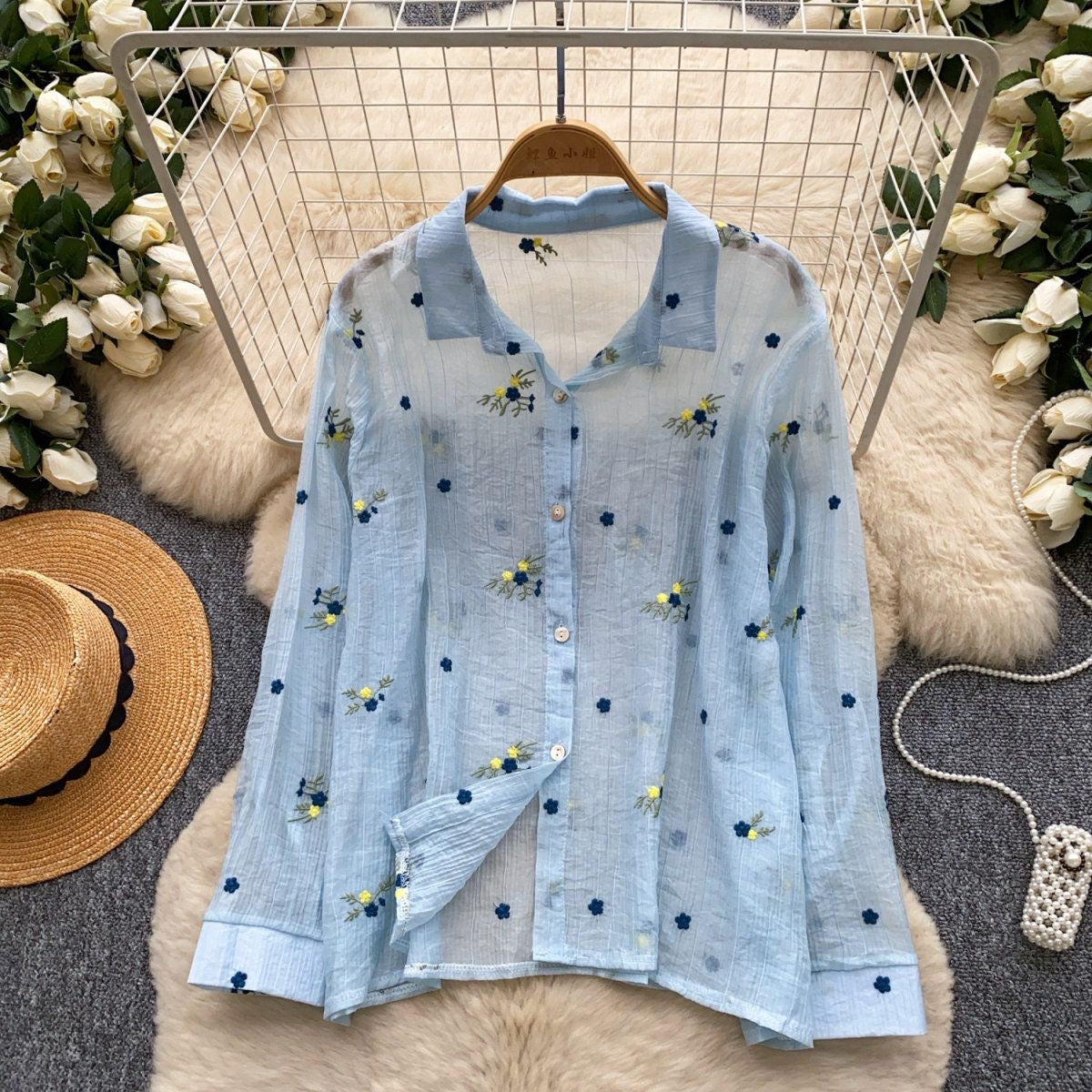 Floral Embroidered Cotton Blouse in Sky Blue, button-down long sleeve shirt with navy and yellow embroidered flowers, boho style