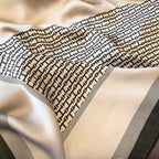 Close-up of fabric with geometric pattern on a beige background