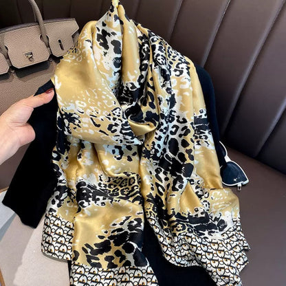 Golden animal print silk stole with black and ivory designer border
