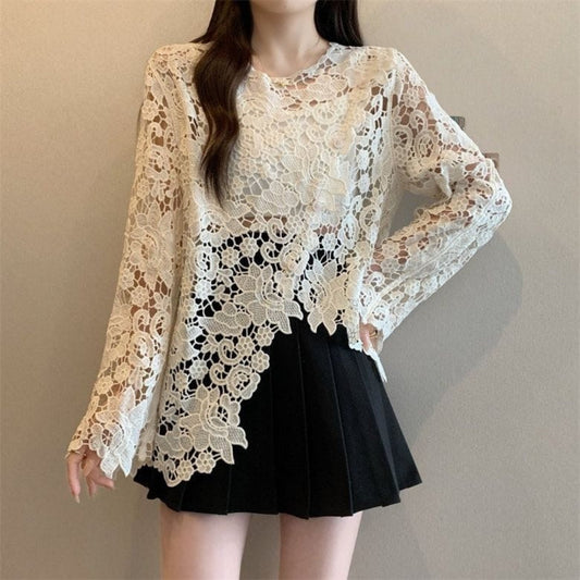 Scalloped floral lace top in cream styled with black mini skirt