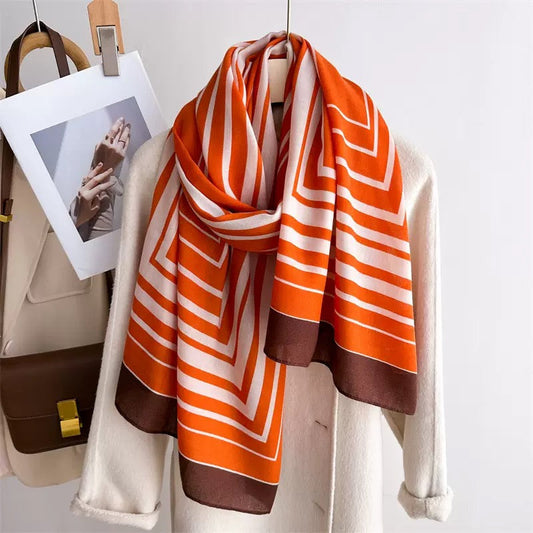 Geometric stripe viscose cotton stole in orange white brown - chevron pattern scarf styled with coat