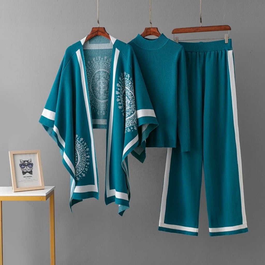Luxury knit 3-piece co-ord set for women in teal and white with printed cape, knitted top and wide-leg pants