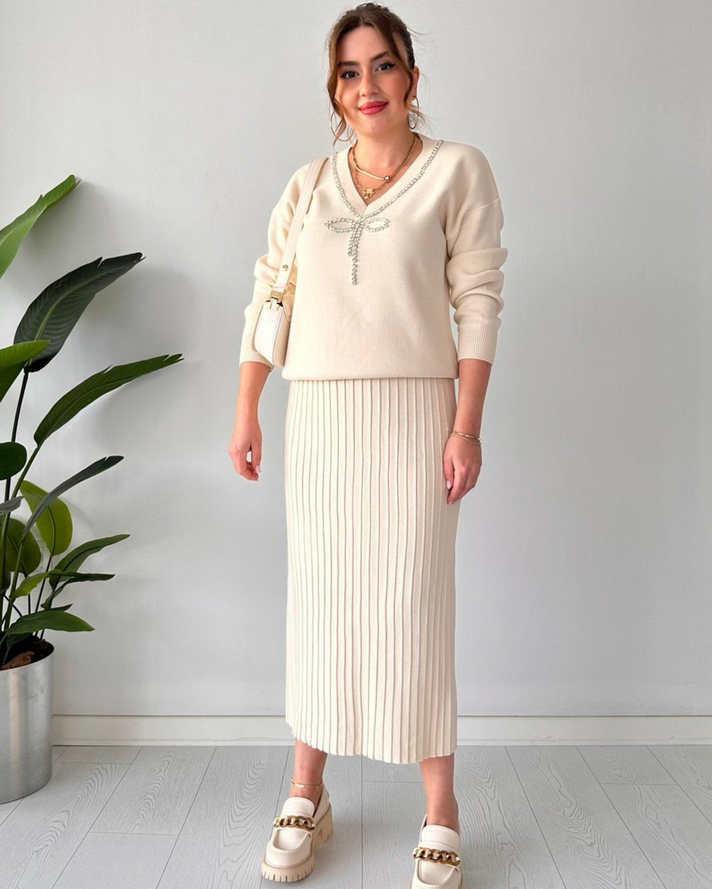 Luxury Knit Two-Piece Set: Embellished V-Neck Sweater & Pleated Midi Skirt