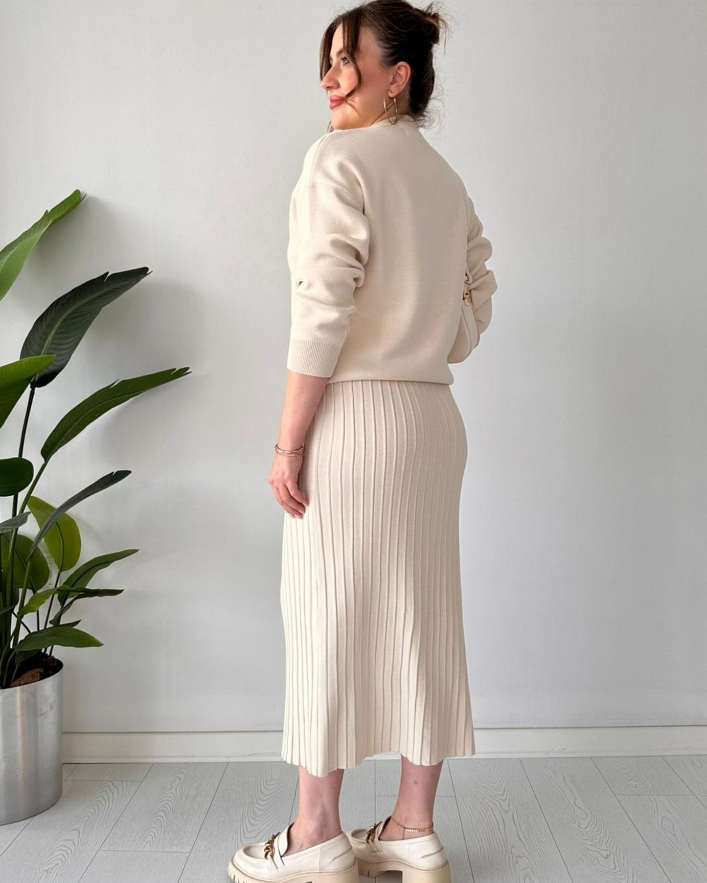 Luxury Knit Two-Piece Set: Embellished V-Neck Sweater & Pleated Midi Skirt