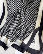 Monochrome chain print cotton stole with black and white border made from soft viscose fabric
