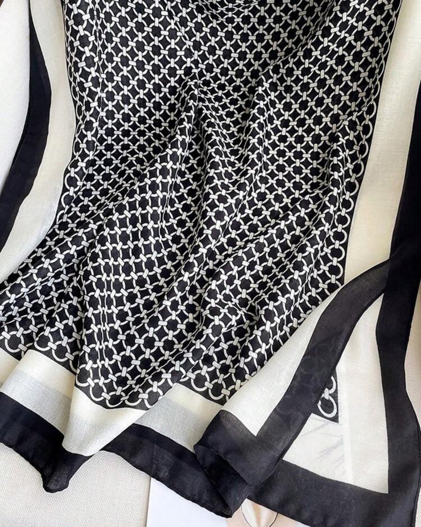 Monochrome chain print cotton stole with black and white border made from soft viscose fabric
