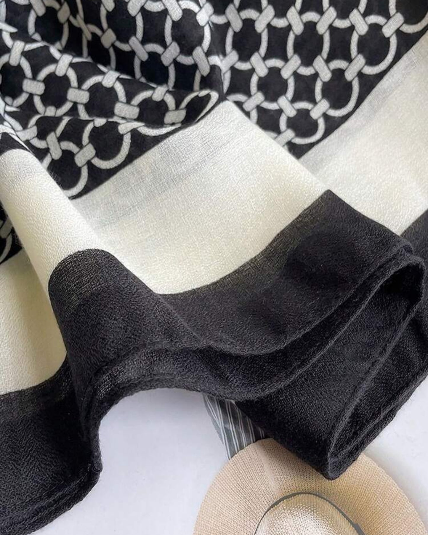 Monochrome chain print cotton stole with black and white border made from soft viscose fabric

