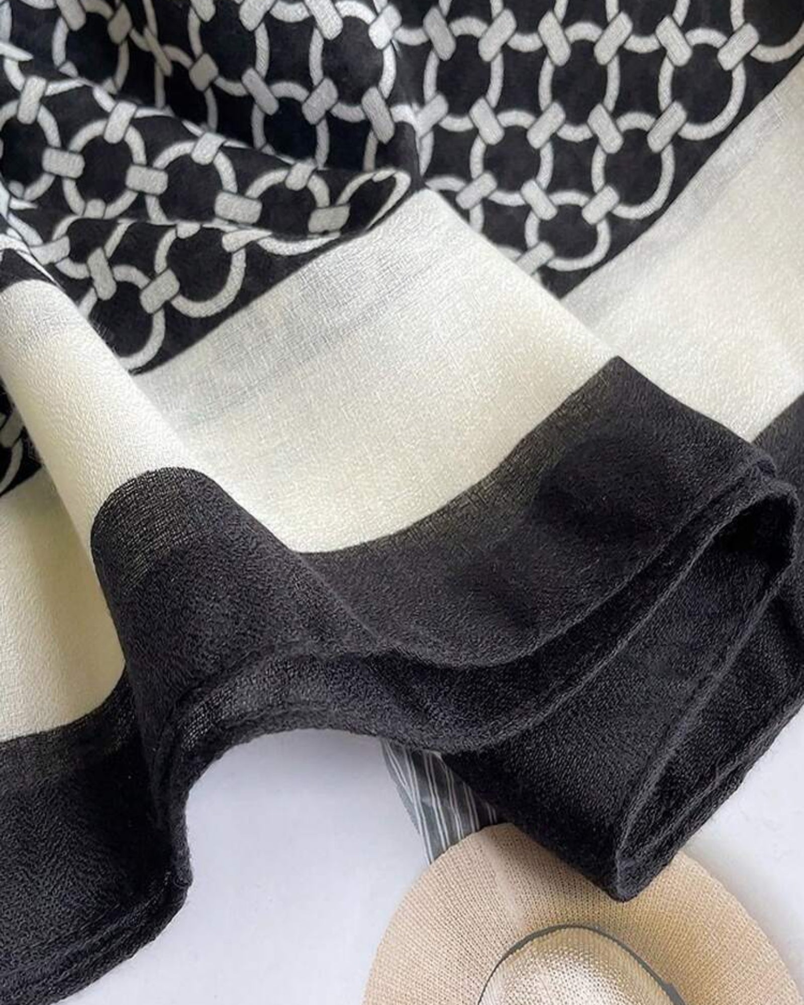 Monochrome chain print cotton stole with black and white border made from soft viscose fabric

