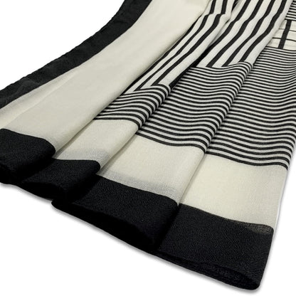 Black and white striped fabric on a white background