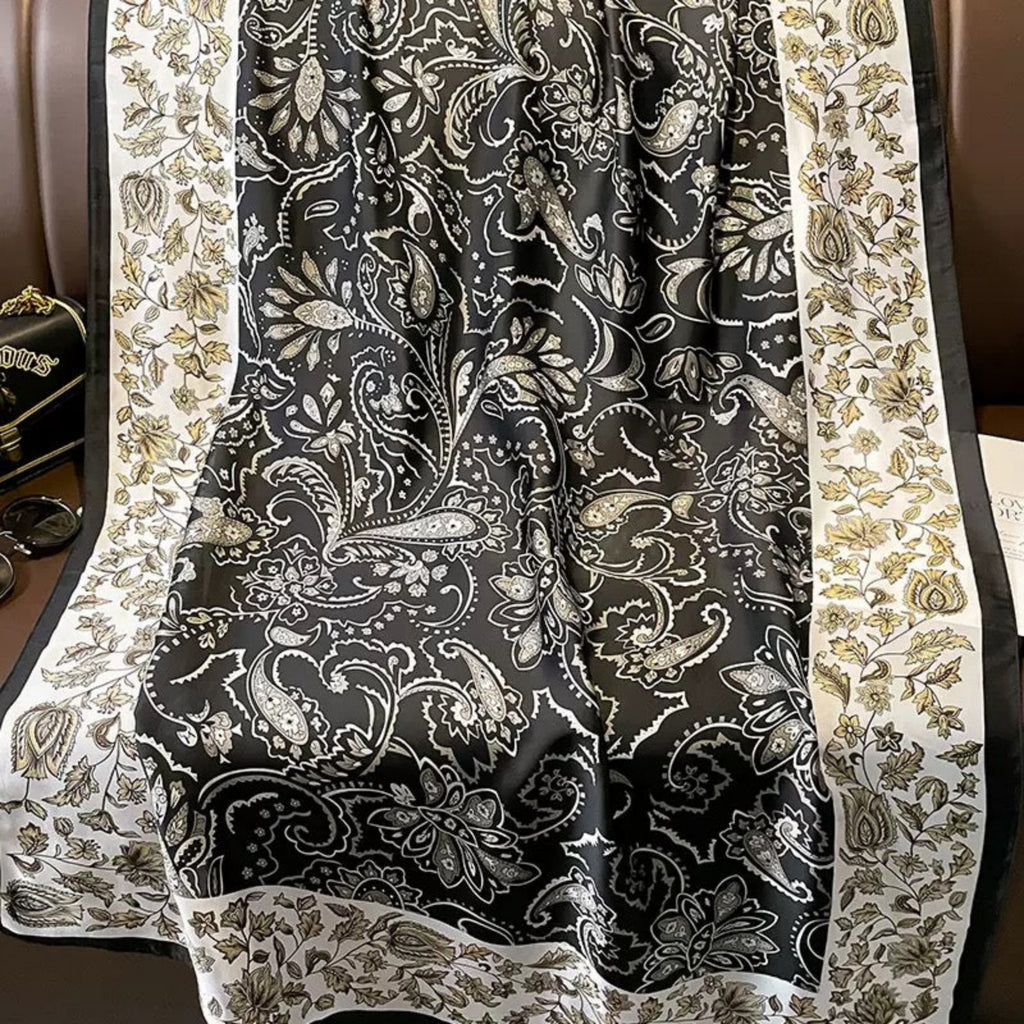 Decorative fabric with intricate paisley pattern on a chair