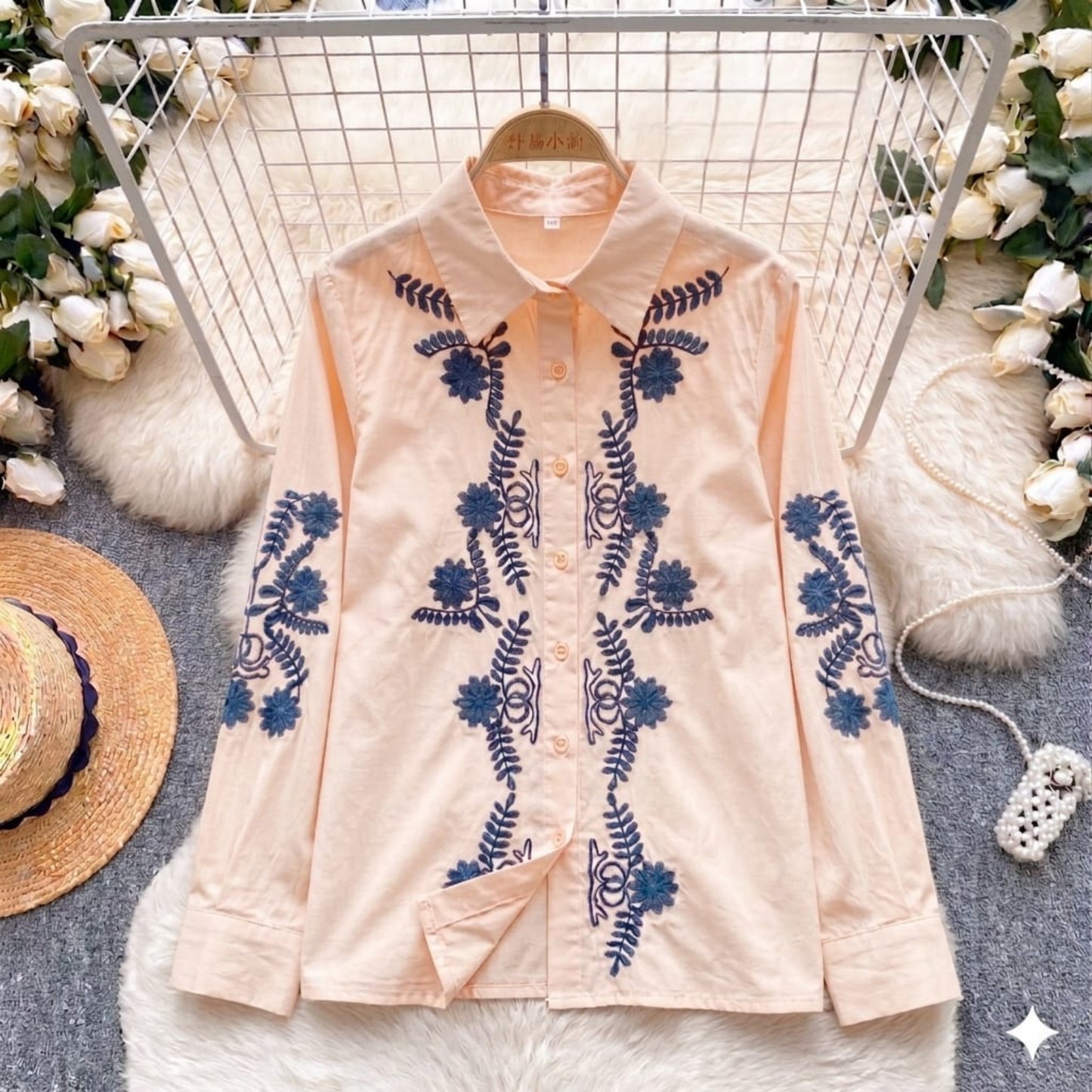 Jardin Embroidered Shirt in Petal — blush pink with navy daisy and fern embroidery detail