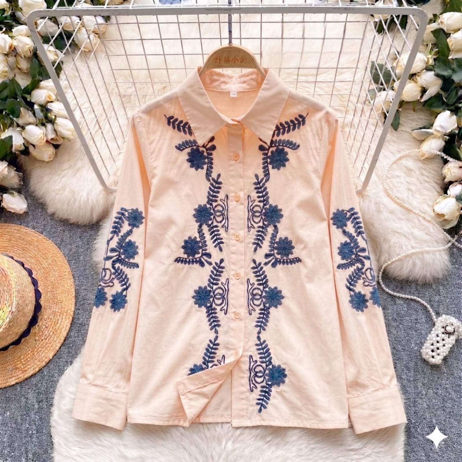 Jardin Embroidered Shirt in Petal — blush pink with navy daisy and fern embroidery detail