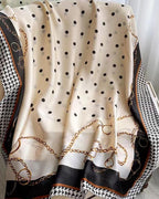 Flat lay of Maison Trio Silk Scarf — 180x90cm full size showing all three print zones