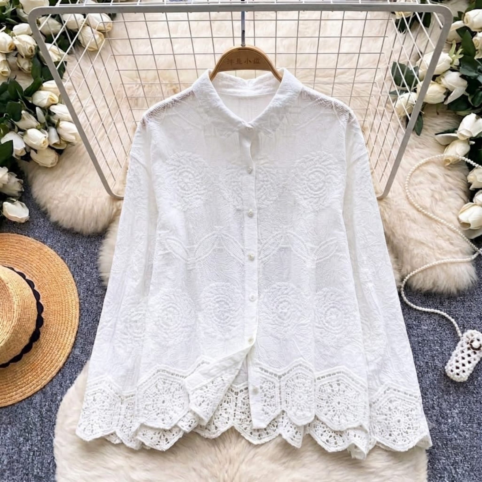 The Meadow Heirloom Embroidered Linen Blouse flatlay in White, linen-cotton blend women's blouse with crochet lace hem, fits bust up to 42 inches