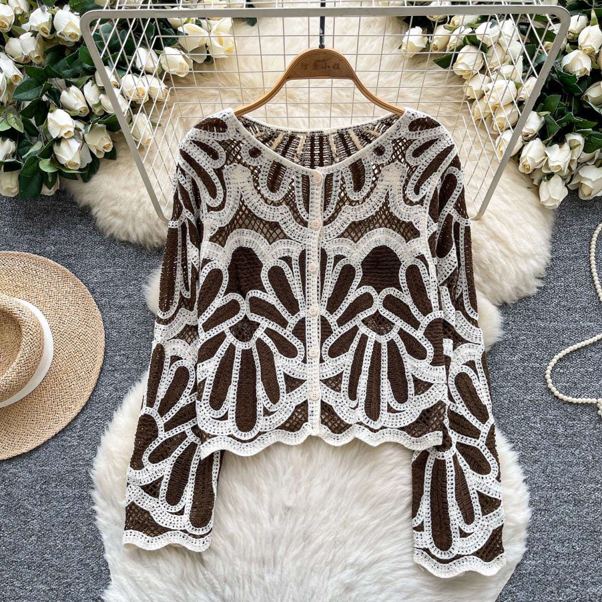 Back view of Riviera Fan Crochet Cardigan showing full fan arch pattern detail