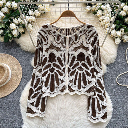 Back view of Riviera Fan Crochet Cardigan showing full fan arch pattern detail