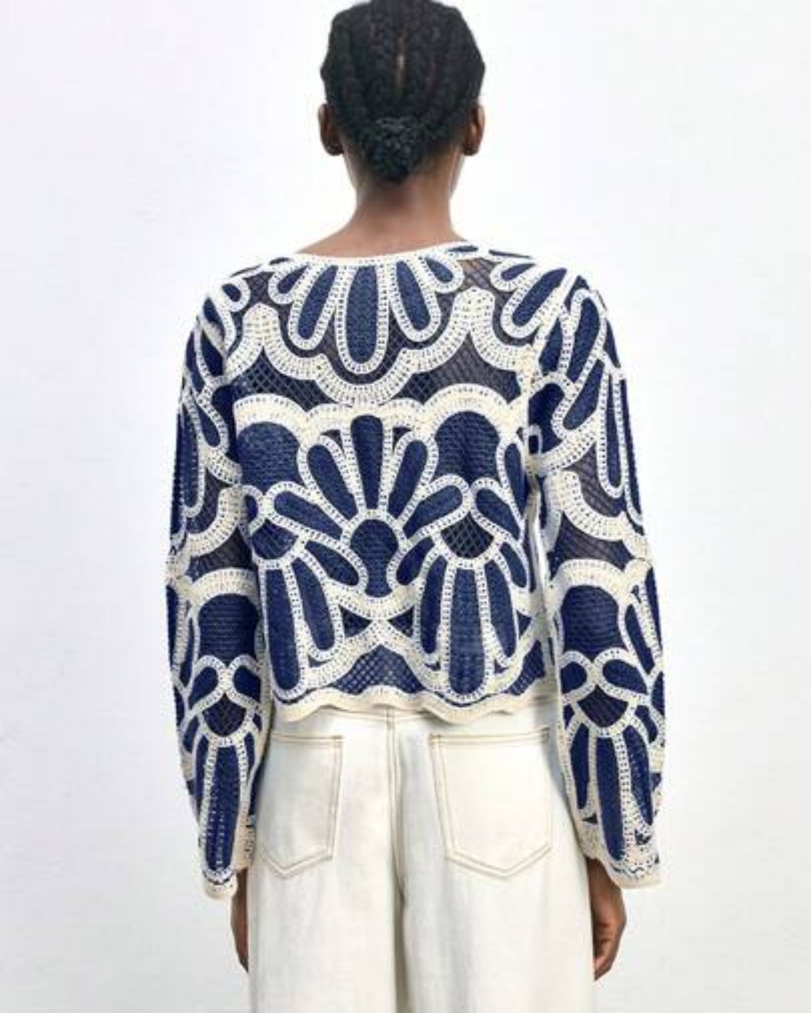 Back view of Riviera Fan Crochet Cardigan showing full fan arch pattern detail