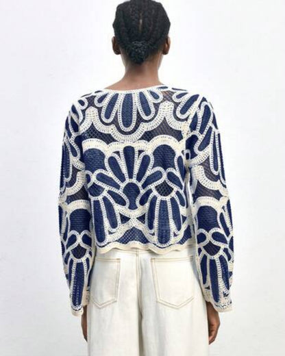 Back view of Riviera Fan Crochet Cardigan showing full fan arch pattern detail