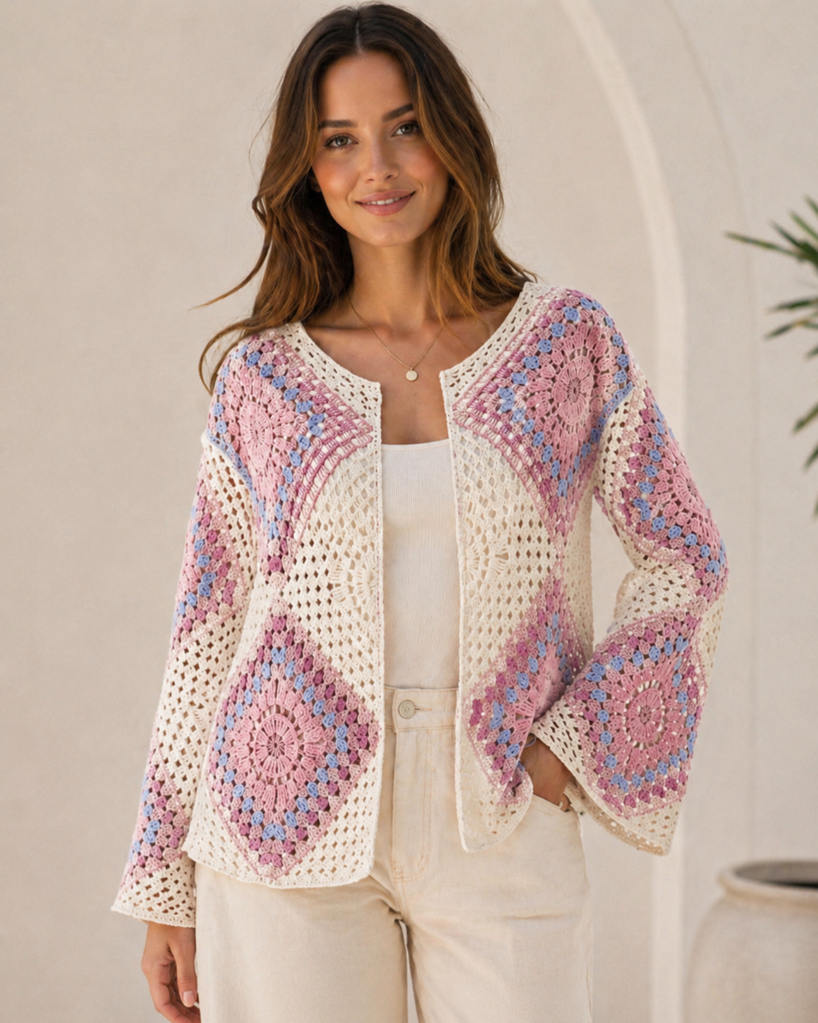 The Soleil Granny Square Crochet Jacket in Mauve Rose colourway — women’s open-front mandala granny square crochet jacket in dusty pink and periwinkle blue on cream, romantic boho cardigan with bell sleeves, free size fits bust up to 42 inches