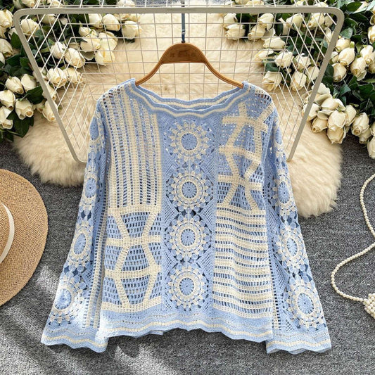 Solstice Crochet Pullover in Horizon — sky blue and ivory patchwork top, flat lay