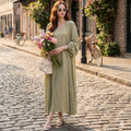The Zephyr Cotton Co-ord Set in Sage — olive green crinkle cotton dress and bishop sleeve shrug, street style