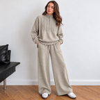 Women’s  beige Alpine Half-Zip Knit Co-ord Set by Westery, featuring a half-zip neckline, cable-knit detailing and wide-leg trousers.