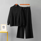 Westery Alpine Half-Zip Knit Co-ord Set in classic black with cable-knit front detailing and matching wide-leg trousers.