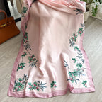 Aveline Blush Bloom Scarf flat lay showing satin floral pattern detail
