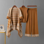 Camel 3-piece knit co-ord set laid flat showing fringe cardigan, top, and pants

