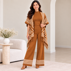Woman wearing camel 3-piece knit co-ord set with fringe-trim cardigan and wide-leg pants