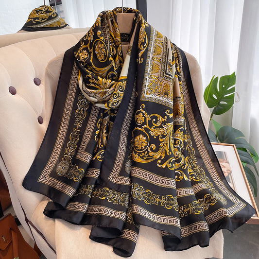 Black gold baroque print imitation silk scarf draped on mannequin - Greek key border luxury scarf