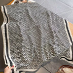 Black White Geometric Greek Key Viscose Cotton Stole shown in alternate drape styling with Greek key meander border in full view

