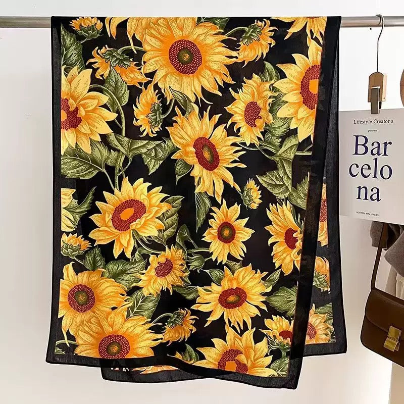Black yellow sunflower print scarf flat lay showing full floral pattern - 180x90 cm viscose cotton scarf