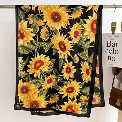 Black yellow sunflower print scarf flat lay showing full floral pattern - 180x90 cm viscose cotton scarf