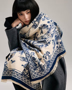 The Bleu Jardin Cashmere Wrap draped and styled showing full blue garden botanical floral print on premium faux cashmere
