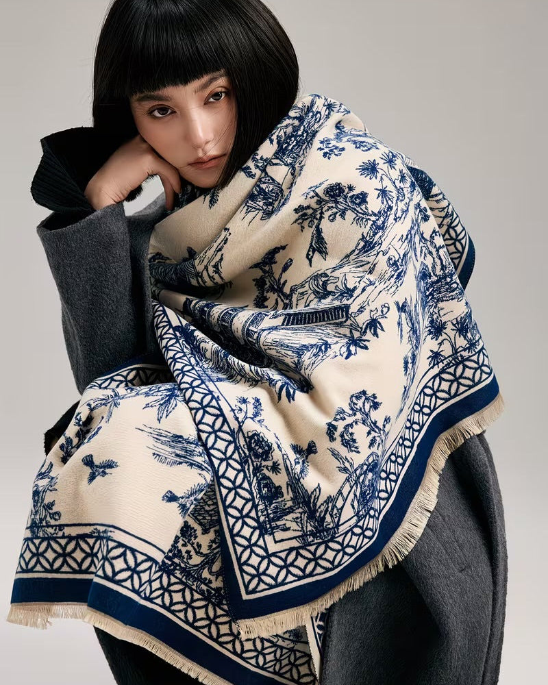 The Bleu Jardin Cashmere Wrap draped and styled showing full blue garden botanical floral print on premium faux cashmere
