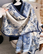The Blue Willow Reversible Wrap draped and styled showing full Blue Willow heritage chinoiserie print on soft faux cashmere
