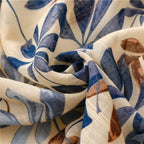 The Bluebell Meadow Linen Stole draped and styled showing full bluebell botanical print on natural linen stole
