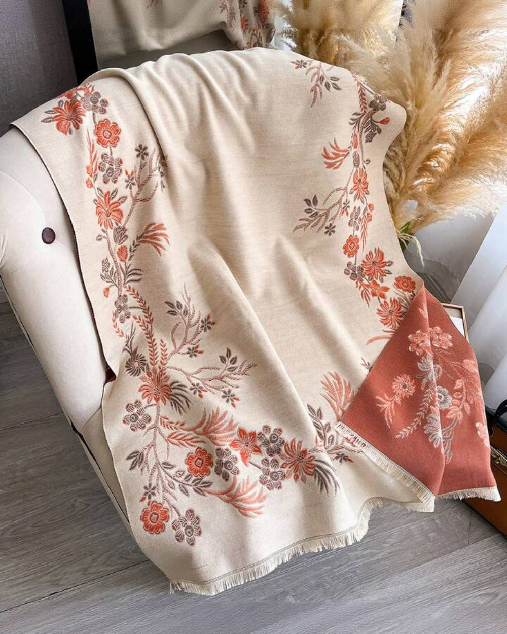 The Blush Botanica Reversible Wrap displayed showing both reversible sides with blush botanical print in contrasting colour expressions
