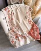 The Blush Botanica Reversible Wrap displayed showing both reversible sides with blush botanical print in contrasting colour expressions
