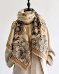 Botanical Bloom Cashmere-Feel Wrap in warm neutral beige showing vintage botanical floral print on soft faux cashmere fabric
